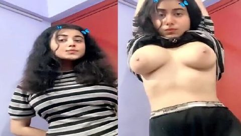 Beautiful girl stripping showing milky boobs