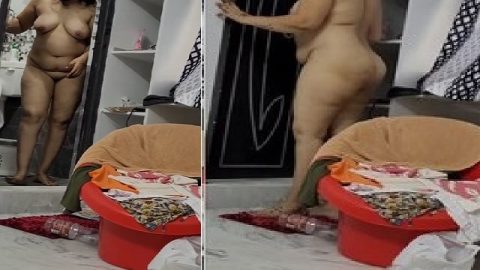 Busty wife walking nude before taking a nude bath