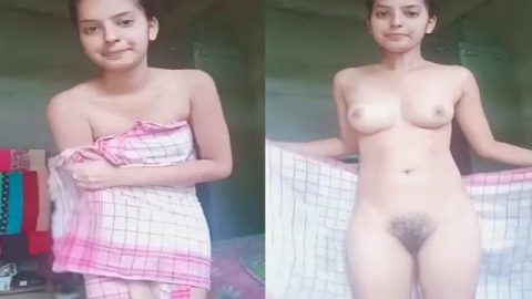 Cute girl stripping towel and showing hairy pussy