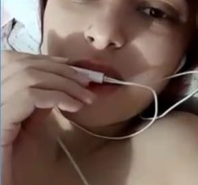 Cute skinny girl showing her small tits on VC