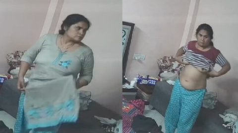Mature aunty dress change on CCTV Indian sex videos