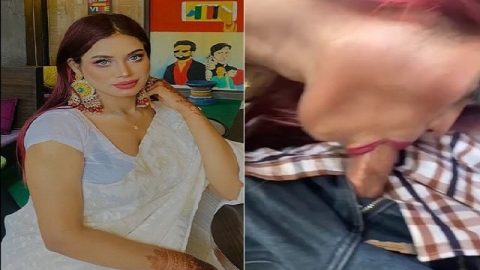 Red head Indian blowjob girl showing cleavage