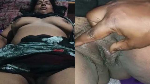 Sleeping mature aunty pussy captured on cam