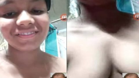 Smiling beautiful girl topless on video call