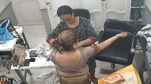 Hot Rich Bhabi Changing parlour Captured In CCTV