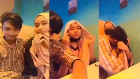 Restaurant Young Boy Enjoying With His Hijabi GF In
