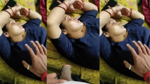 Son groping his mom's boobs while she is sleeping